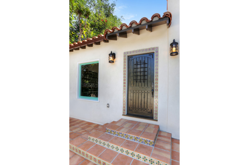 real estate development, spanish revival, los feliz, los angeles, white stucco, teal windows, spanish colonial, hand painted tile