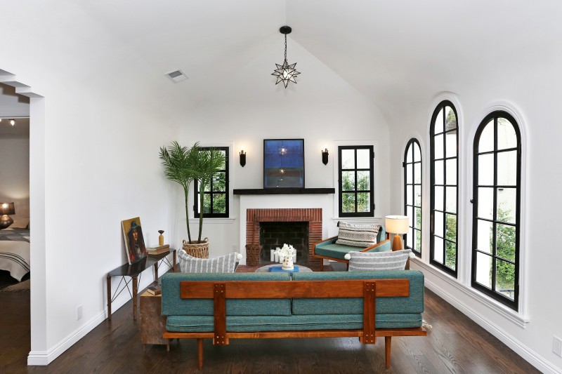 real estate development, spanish revival, los feliz, los angeles, white stucco, teal windows, spanish colonial, hand painted tile