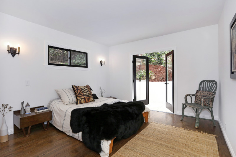 real estate development, spanish revival, los feliz, los angeles, white stucco, teal windows, spanish colonial, hand painted tile