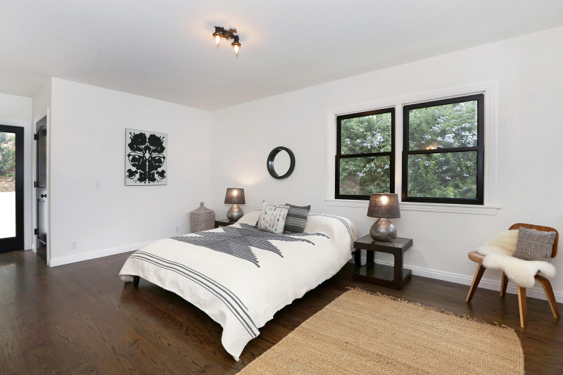 real estate development, spanish revival, los feliz, los angeles, white stucco, teal windows, spanish colonial, hand painted tile