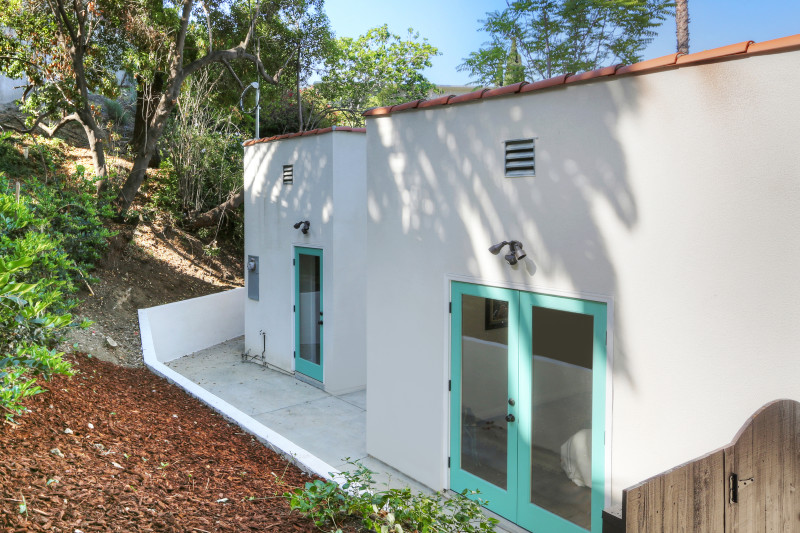 real estate development, spanish revival, los feliz, los angeles, white stucco, teal windows, spanish colonial, hand painted tile